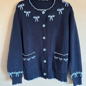 BloomChic Navy Blue Cardigan with Bow Accents